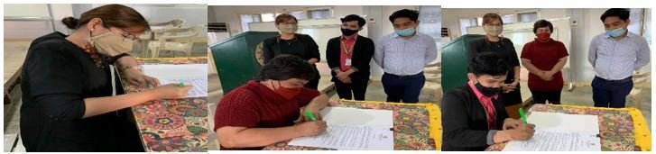LPC spectators witness Ceremonial Contract Signing for Commissioned Researches